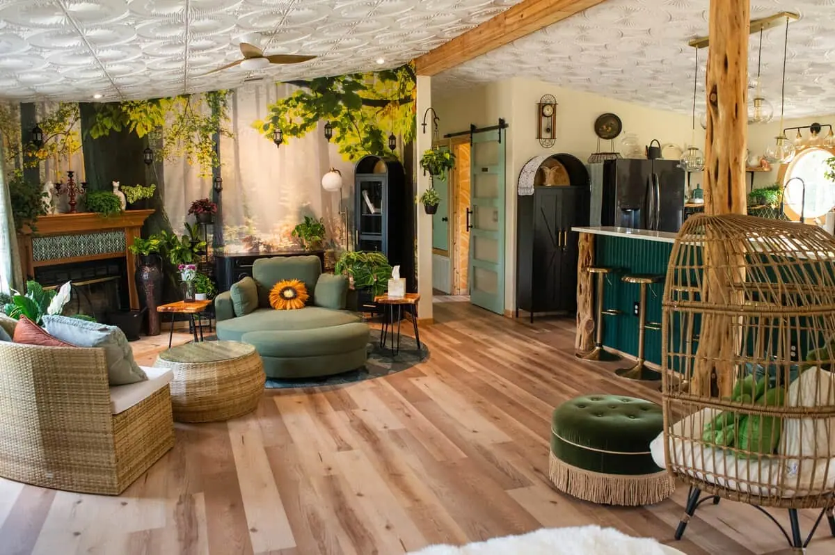 The Soul Sanctuary main room with its forest mural and fireplace